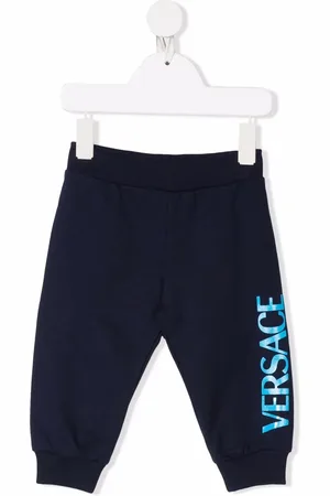 VERSACE Pants con logo estampado