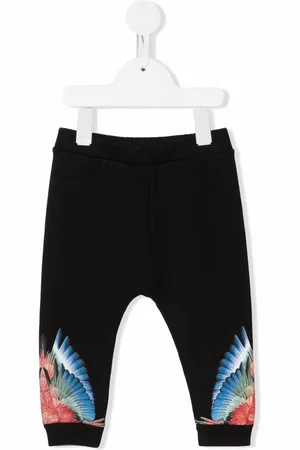 MARCELO BURLON Pants con estampado Wings