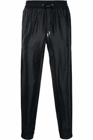 Saint Laurent Pantalones tapered con rayas laterales