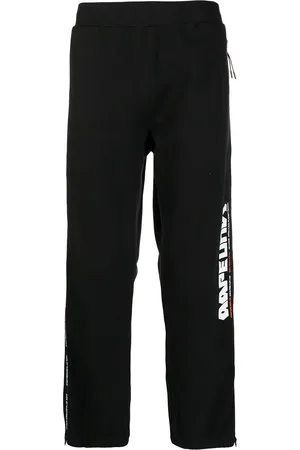 A Bathing Ape Pantalones con detalles de cierres