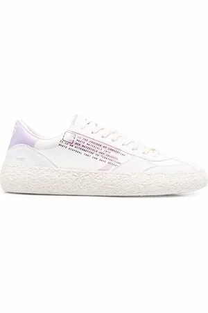 Puraai Tenis bajos con eslogan