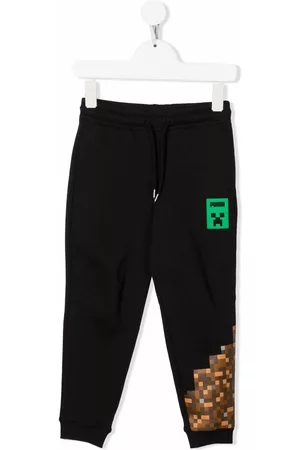 PUMA Pantalones - Pants con logo estampado