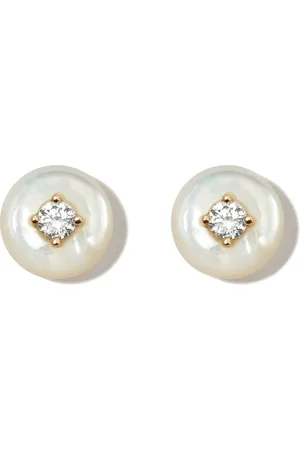 Fernando Jorge Aretes Surround en oro amarillo de 18kt con diamante