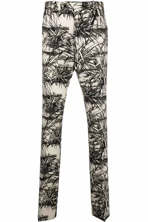 AMIRI Pantalones acampanados con estampado gráfico