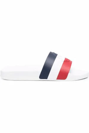Moncler Flip flops a rayas con logo en relieve