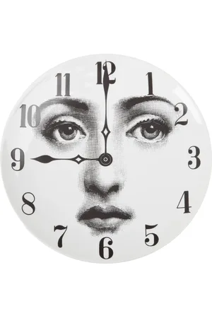 FORNASETTI Plato con motivo de rostro y reloj