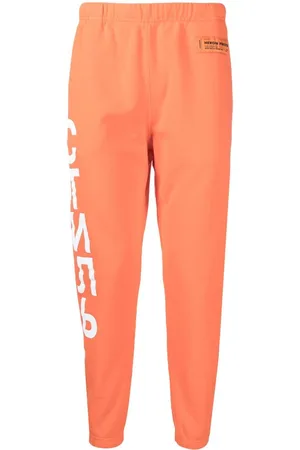 Heron Preston Pants con motivo СТИ ЛЬ