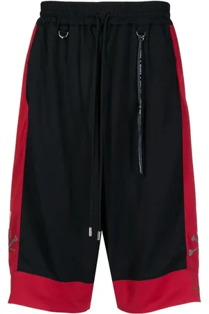 MASTERMIND Shorts con logo y ribete en contraste