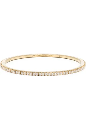 ROBERTO DEMEGLIO Brazalete elástico en oro amarillo de 18kt con diamantes