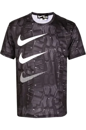 Comme des Garçons Playera con estampado Swoosh