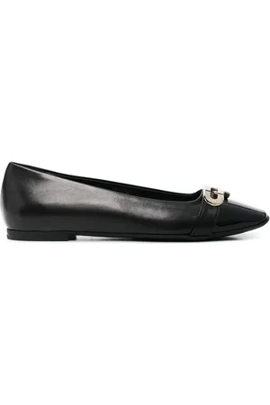 Furla Flats con placa del logo