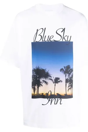 BLUE SKY INN Playera con palmeras estampadas