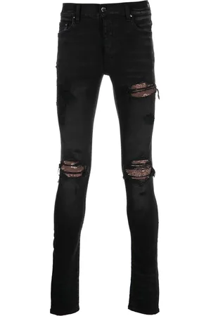AMIRI Skinny jeans con efecto envejecido