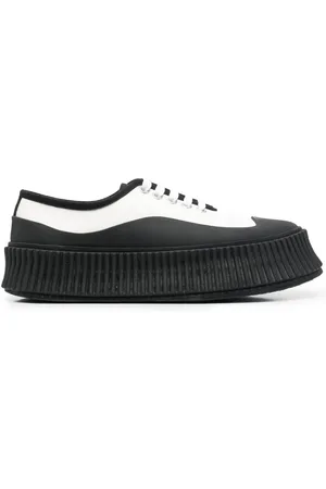 Jil Sander Tenis con agujetas y suela gruesa