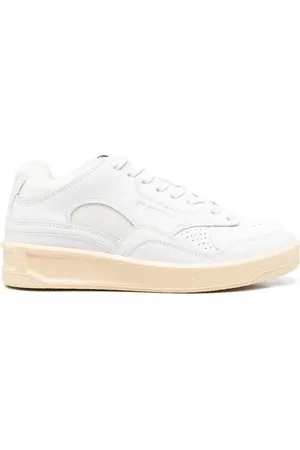 Jil Sander Tenis bajos con logo en relieve