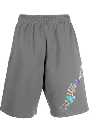 MARTINE ROSE Bermudas con eslogan estampado
