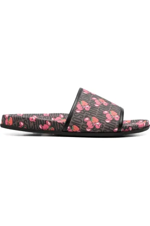 Moschino Flip flops con logo estampado