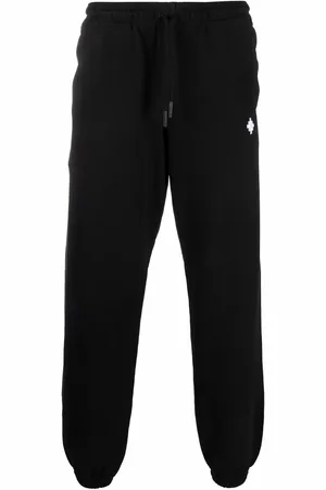 MARCELO BURLON Pants con logo bordado