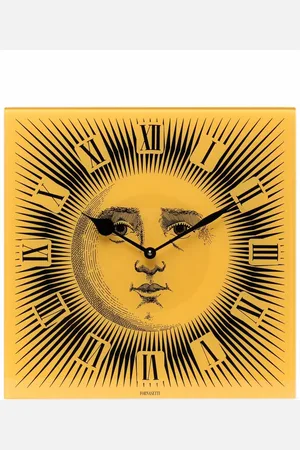 FORNASETTI Reloj de pared con motivo de sol