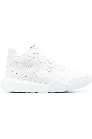 Alexander McQueen Tenis bajos con perforaciones
