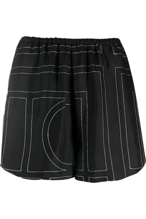 Totême Shorts de playa con estampado geométrico