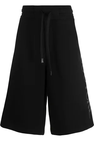 VERSACE Shorts con logo estampado