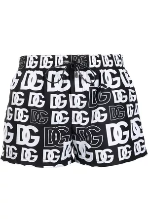 Dolce & Gabbana Shorts de playa con monograma estampado