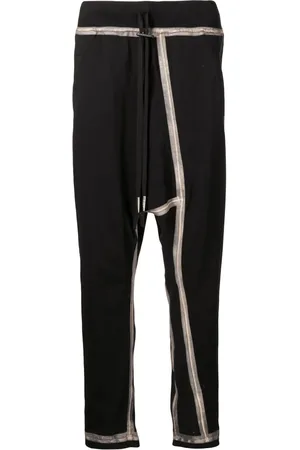 11 BY BORIS BIDJAN SABERI Pants con paneles y cordones en la pretina
