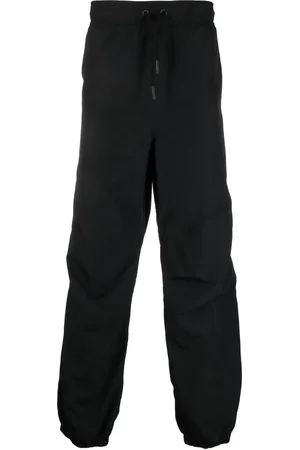 MARCELO BURLON Pantalones con cordones en la pretina