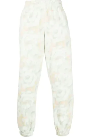 MARTINE ROSE Pants con estampado floral