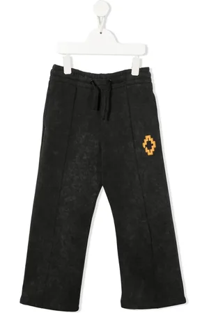 MARCELO BURLON Pants con cordones y logo estampado