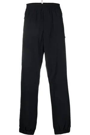 Moncler Pantalones rectos con logo estampado