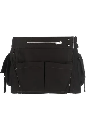 DION LEE Falda corta con detalle de hebilla