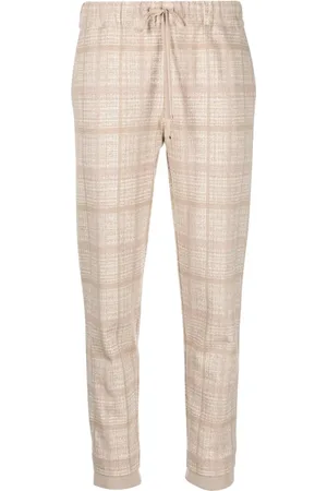 D.EXTERIOR Pantalones tapered con cordones en la pretina