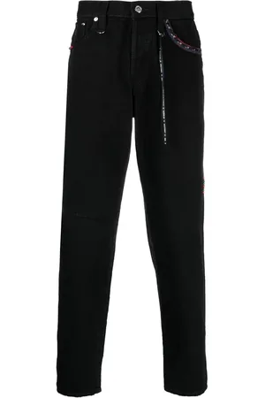 MASTERMIND Jeans con logo bordado y cierre en los tobillos