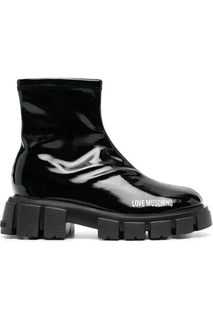 Moschino Botas brillantes con logo estampado y tacón de 50mm