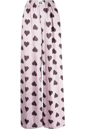 Natasha Zinko Pantalones con estampado de corazones