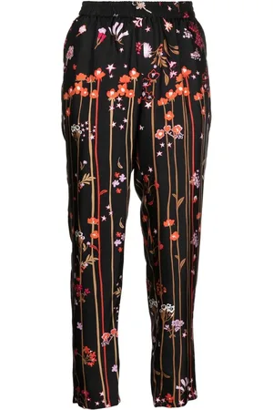 RED Valentino Pantalones de seda con estrellas estampadas