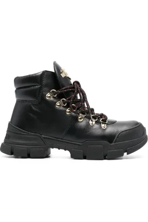 Moschino Botines con agujetas y placa del logo