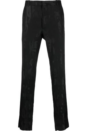 Alexander McQueen Pantalones de vestir con logo estilo grafiti en jacquard