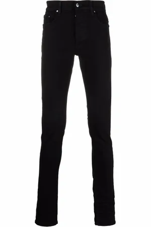 AMIRI Skinny jeans con placa del logo