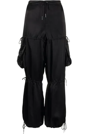 Anna Sui Pantalones rectos con bolsillos y efecto satinado