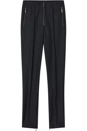 Jimmy Choo Pants para nieve con monograma estampado