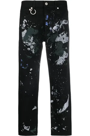 Etudes Jeans rectos con salpicadura de pintura estampada