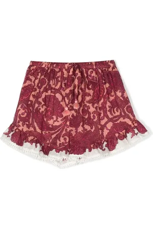 ZIMMERMANN Shorts con estampado geométrico y volantes
