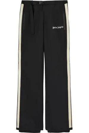 Palm Angels Pantalones para nieve Track con logo estampado