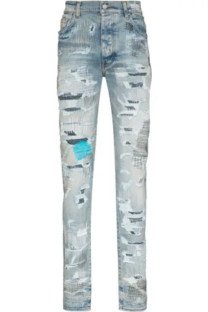 AMIRI Skinny jeans con acabado envejecido