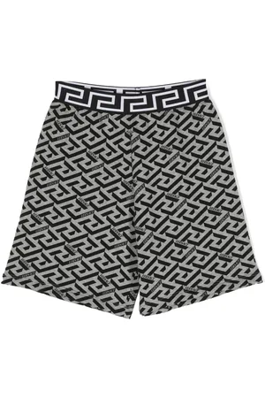 VERSACE Bermudas con monograma estampado