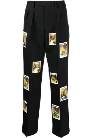 DENIM TEARS Pantalones con estampado polaroid