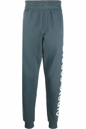 Etudes Pants con logo estampado